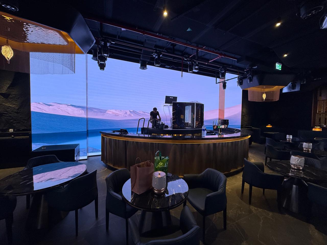 Curved LED wall behind a lounge bar